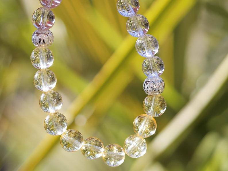 Sterling 925 Silver - Rock crystal and Golden Rutilated Quartz bracelet with 2 beautiful Silver Matte Round Beads.