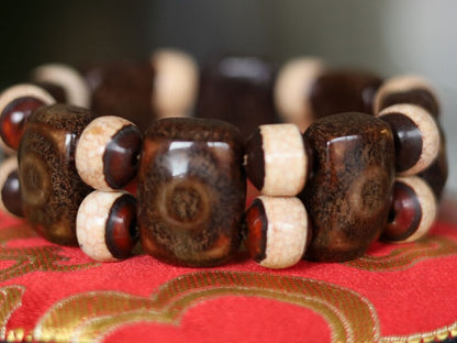 Bracelet of Agate/Carnelian feels silky soft, size of the bead 15x25mm, with separate Tibetan symbols. Unique Tibetan Bracelets