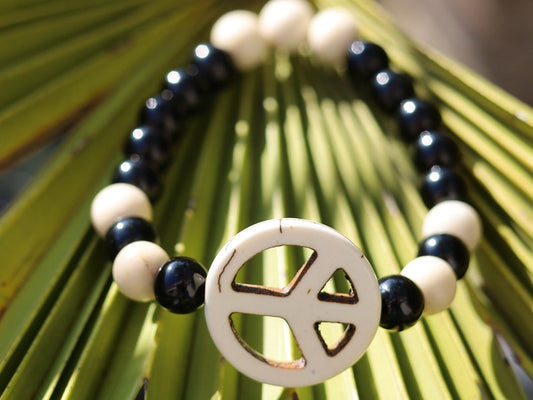 Viśēśa Jewel Collection - WORLD PEACE bracelet with White Jasper, black Onyx.  It also opens, heals, and activates the Root Chakra.