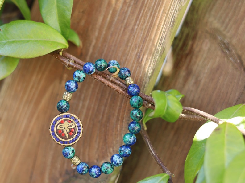 Viśēśa Jewel Collection - Miraculous Buddha eyes Blue Jade  bracelet. These eyes look in four directions to symbolize his wisdom.