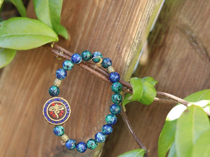 Viśēśa Jewel Collection - Miraculous Buddha eyes Blue Jade  bracelet. These eyes look in four directions to symbolize his wisdom.