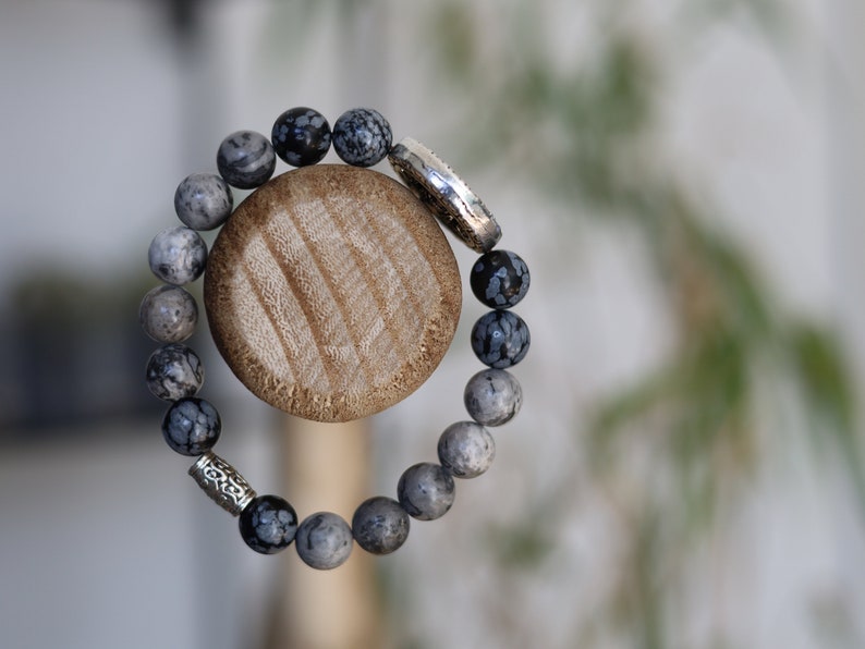 Viśēśa Jewel Collection - Awesome Buddhist Jewelry bracelet. Bracelet made with  different beads. Snowflake Obisidan and Silver Leaf Jasper.