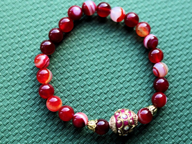 Viśēśa Jewel Collection - Unique cool Dark red agate beautiful grade.  Connects to guardian angels above and Mother Earth below