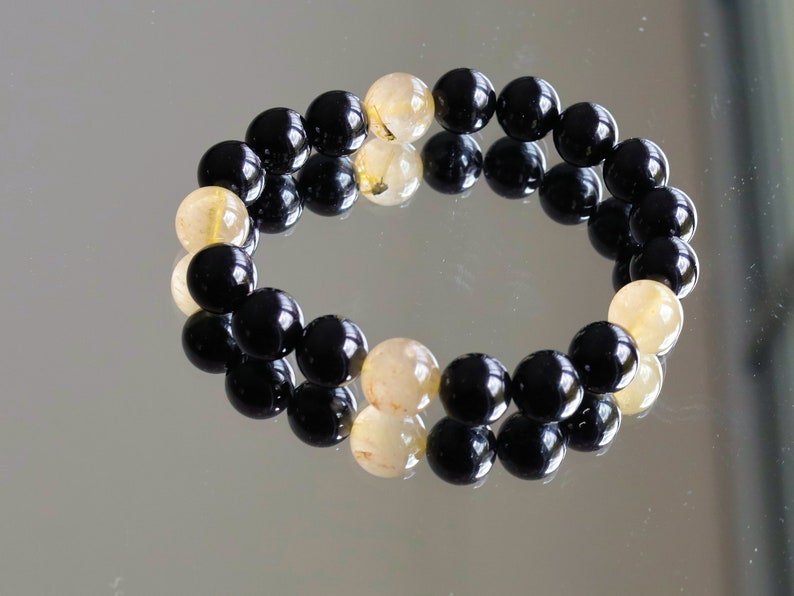 bLACKLINE SERIES Black Agate/  beautiful Rutilated quartz bracelets. Enhances creativity , the intellect, making it a beneficial stone