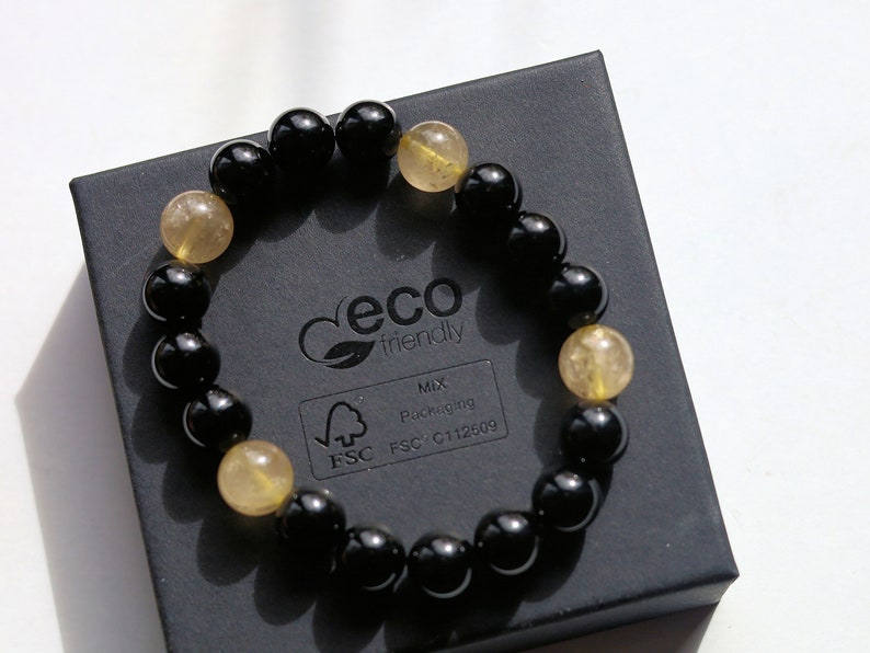 bLACKLINE SERIES Black Agate/  beautiful Rutilated quartz bracelets. Enhances creativity , the intellect, making it a beneficial stone