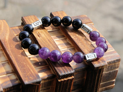 Unfrequent Amethyst crystal bracelet with Black Agate.  Connect to your inner peace and leave the rest behind.