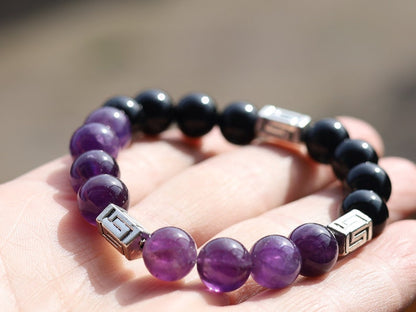 Unfrequent Amethyst crystal bracelet with Black Agate.  Connect to your inner peace and leave the rest behind.