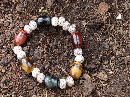 Natural Tri color Tiger Eye Stone Drum Bucket Beads bracelet with Well-formed Natural Starmoon Bodhi Barrel Beads.
