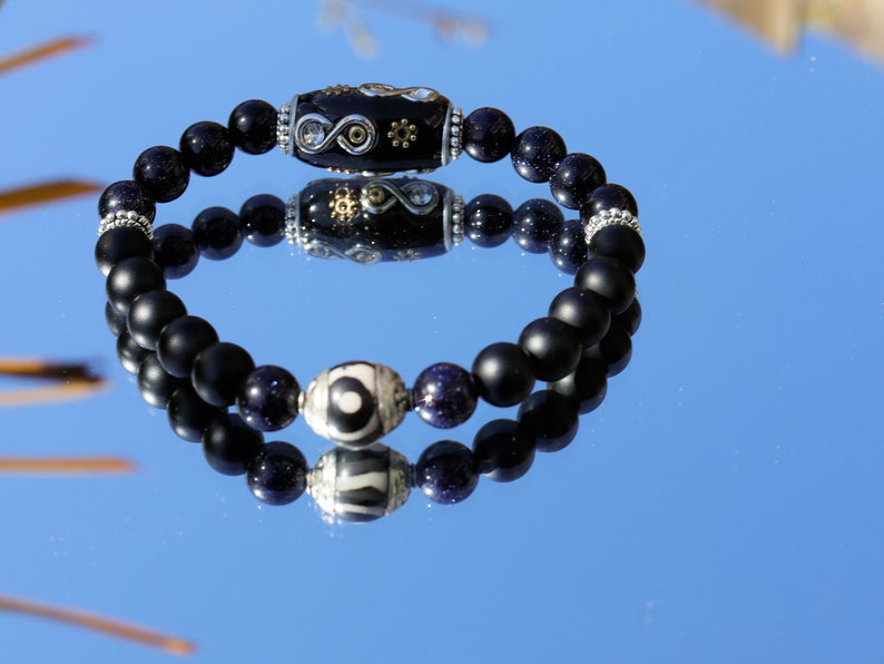 Garamī dā samāṁ Jewel Collection - Curious matte Agate combined with Blue Goldstone  and great Indonesia Bead, with Iron Core.