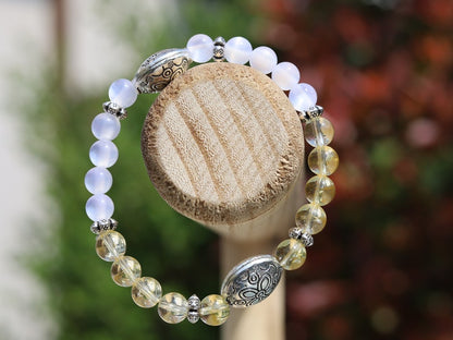 Intrinsic Natural Top Grade White Moonstone Cat Eye Selenite with the Citrine stone.  bright and happy energy fills your spirit