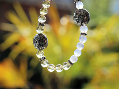 Intrinsic Natural Top Grade White Moonstone Cat Eye Selenite with the Citrine stone.  bright and happy energy fills your spirit