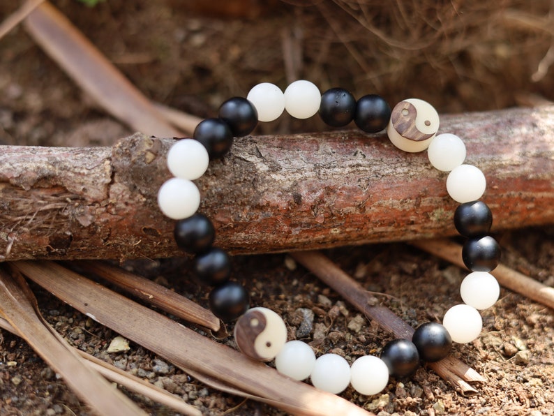 Ethereal White Bodhi Apple Beads bracelet with Carved YinYang, Taiji Bead, Bagua, Zen,Buddha,Yoga Bead. two opposite sides come together