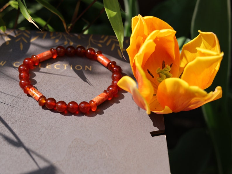 red Agate with great painted wooden artcraft beads. Beautiful spiritual crystals and AA grade gemstones beads.