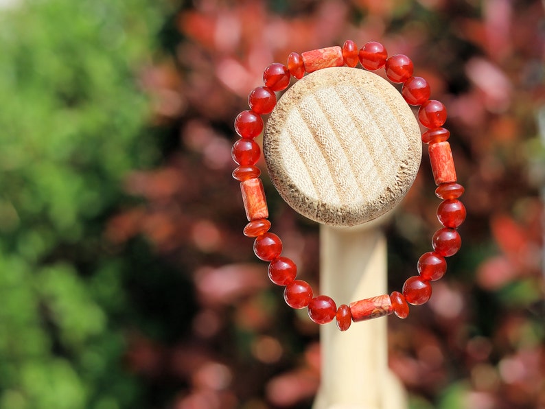 red Agate with great painted wooden artcraft beads. Beautiful spiritual crystals and AA grade gemstones beads.