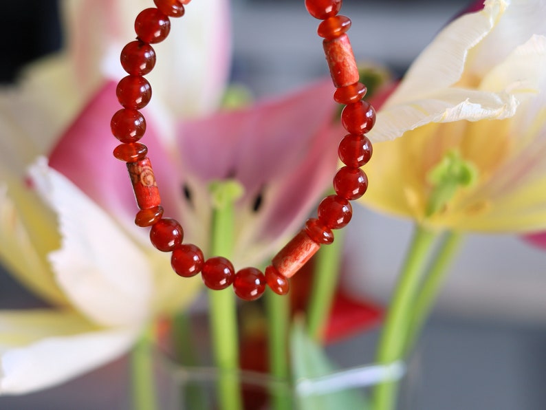 red Agate with great painted wooden artcraft beads. Beautiful spiritual crystals and AA grade gemstones beads.