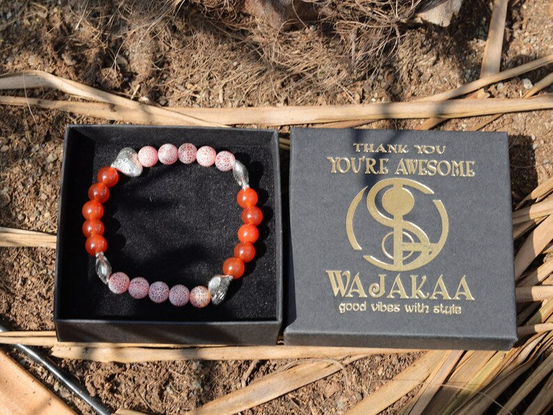 Subliminal Carnelian combined with Matte Frosted Agate Beads and beautiful Tibetan Style Carved Heart. Efficient, positive communication.
