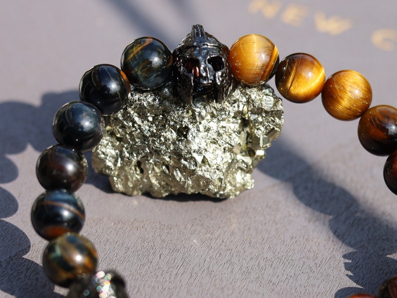 Fearless 3D Gladiator Helmet with TRI color Tiger Eye beads. Useful for recognizing one’s own needs in relation to the needs of others.