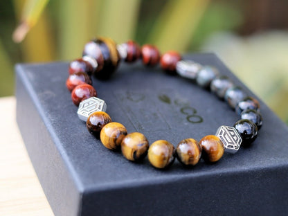 Wonderful TRI color Tiger eye bracelet with hexagon. Is found throughout nature, religions insist it is a symbol of harmony and balance