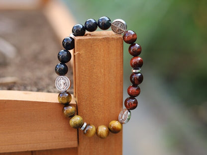 Devoted TRI color Tiger eye bracelet with Jesus and Latin Cross. Pagan symbol in Asian and African countries and a platform for crucifixion