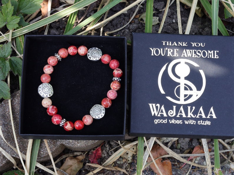 Shine Natural Sea Sediment Red Jasper with Sun Patterns.  Represents the highest form of intelligence, spiritual intelligence.