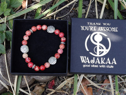 Shine Natural Sea Sediment Red Jasper with Sun Patterns.  Represents the highest form of intelligence, spiritual intelligence.