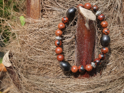 Surprising Natural Mahogany Obsidian bracelet with nice set of handmade Horn Beads. Have better results and more rewarding endeavors