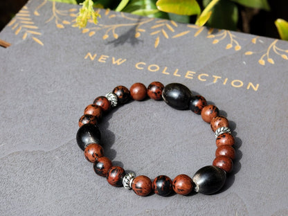 Surprising Natural Mahogany Obsidian bracelet with nice set of handmade Horn Beads. Have better results and more rewarding endeavors