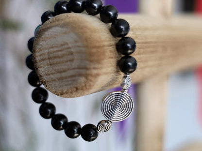 bLACKLINE SERIES Shungite bracelets combined with The Universe Spiral. Reach harmony between your body and soul.
