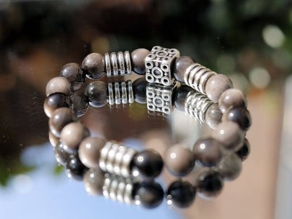 Magnificent semi Precious Stone Smooth Silver Sheen Obsidian Gemstone Beads bracelet. Combined with beautiful cube Bead.