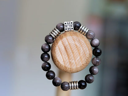 Magnificent semi Precious Stone Smooth Silver Sheen Obsidian Gemstone Beads bracelet. Combined with beautiful cube Bead.