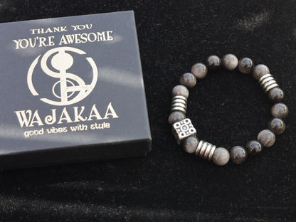 Magnificent semi Precious Stone Smooth Silver Sheen Obsidian Gemstone Beads bracelet. Combined with beautiful cube Bead.
