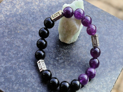Unfrequent Amethyst crystal bracelet with Black Agate.  Connect to your inner peace and leave the rest behind.