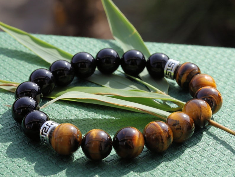 Bewitching Tiger's Eye crystal combined with black Agate. Need a boost of bravery, create a powerful crystal program for building courage