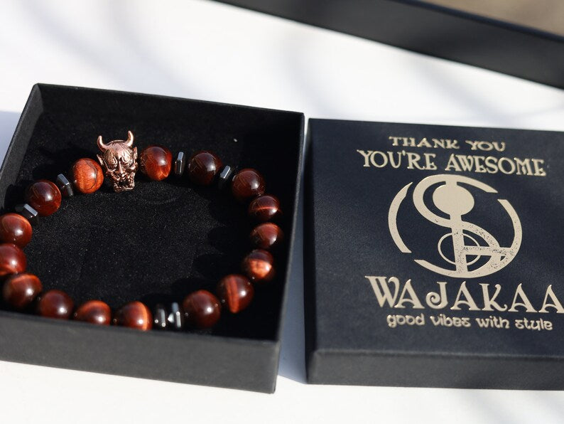 Enticing RED Tiger's Eye crystal combined with Devil Style Alloy Bead. Red Tiger Eye, or Dragon’s Eye, is Tiger Eye with red shades and hues