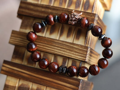 Enticing RED Tiger's Eye crystal combined with Devil Style Alloy Bead. Red Tiger Eye, or Dragon’s Eye, is Tiger Eye with red shades and hues