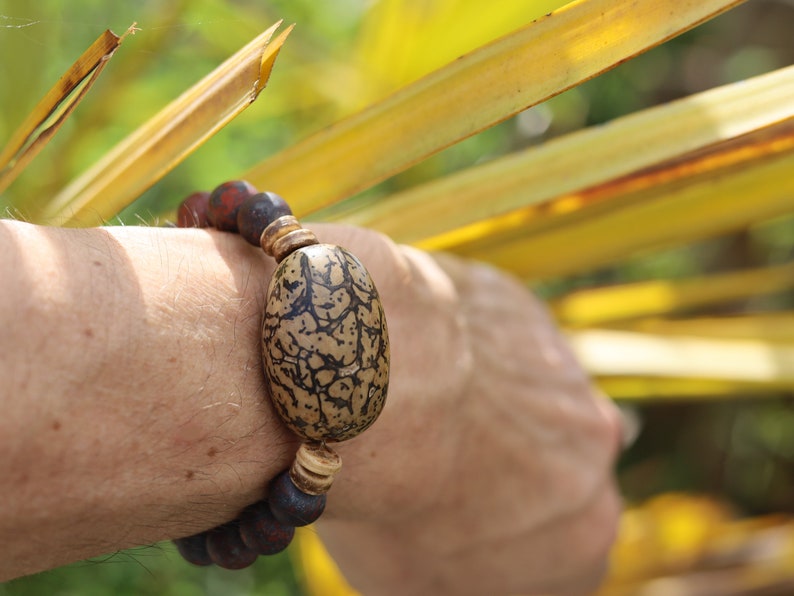 Remarkable Natural Saffron Jasper Beads , High Quality in Matte Round combined with big Buddha Tree Seeds Bead.