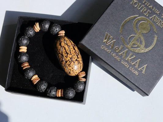 Special big  Lava stones bracelet with beautiful and very large bead: Tropical Seed/Kernel. Buddha Tree Seeds Bead.