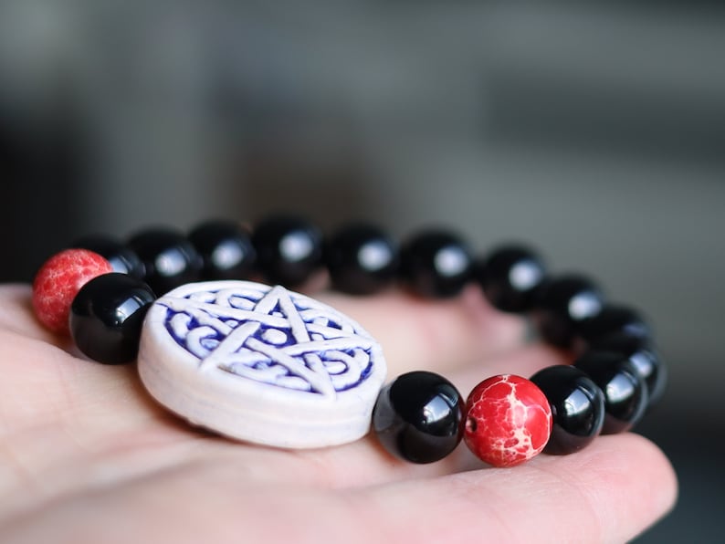 Surprising , Black Agate combines with Natural Sea Sediment Jasper Beads. a symbol of protection, pentagram represents chaos.