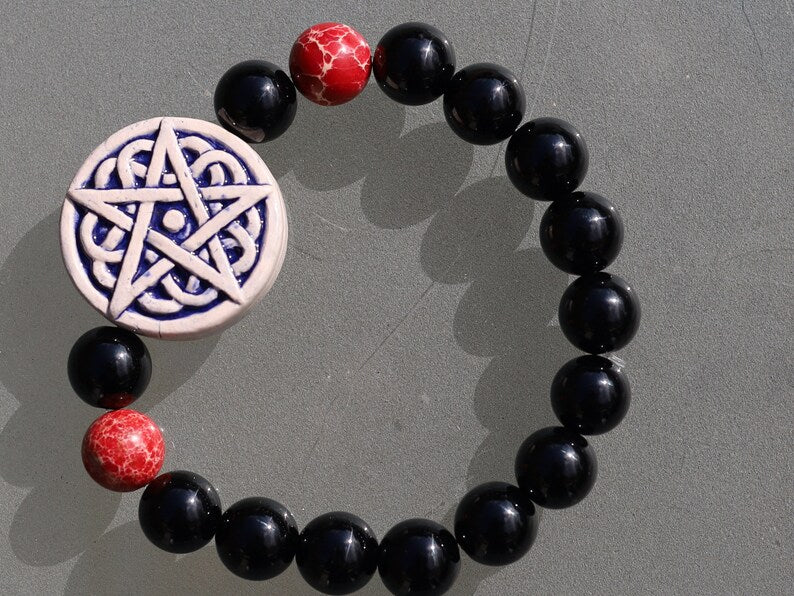 Surprising , Black Agate combines with Natural Sea Sediment Jasper Beads. a symbol of protection, pentagram represents chaos.