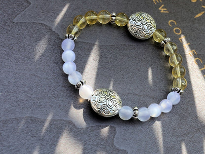 Intrinsic Natural Top Grade White Moonstone Cat Eye Selenite with the Citrine stone.  bright and happy energy fills your spirit