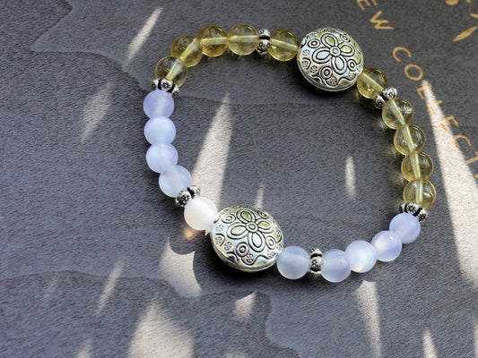 Intrinsic Natural Top Grade White Moonstone Cat Eye Selenite with the Citrine stone.  bright and happy energy fills your spirit