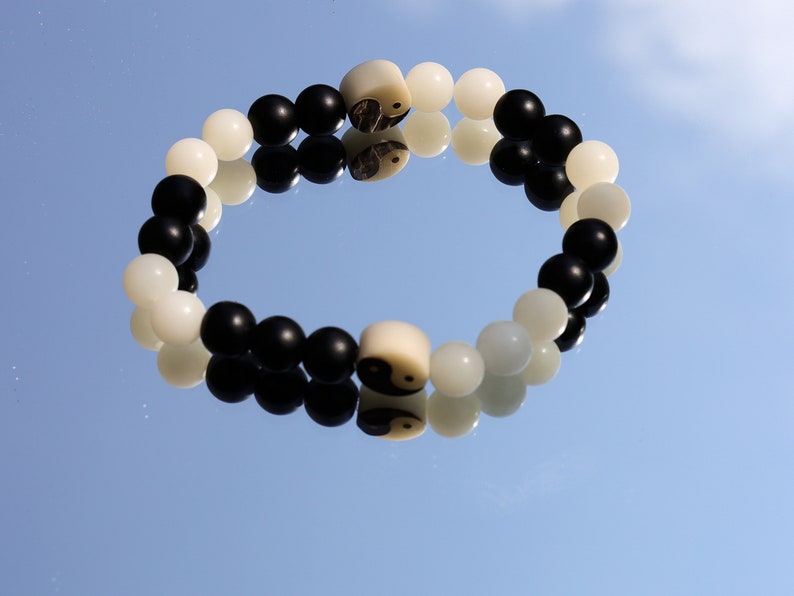 Ethereal White Bodhi Apple Beads bracelet with Carved YinYang, Taiji Bead, Bagua, Zen,Buddha,Yoga Bead. two opposite sides come together