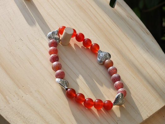 Subliminal Carnelian combined with Matte Frosted Agate Beads and beautiful Tibetan Style Carved Heart. Efficient, positive communication.