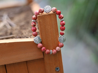 Shine Natural Sea Sediment Red Jasper with Sun Patterns.  Represents the highest form of intelligence, spiritual intelligence.