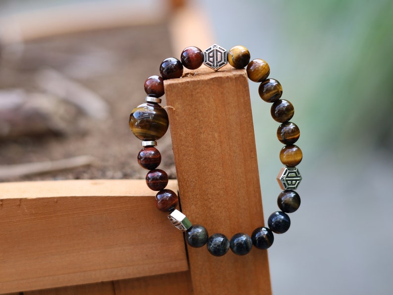 Wonderful TRI color Tiger eye bracelet with hexagon. Is found throughout nature, religions insist it is a symbol of harmony and balance
