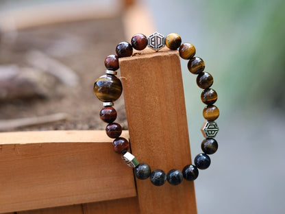 Wonderful TRI color Tiger eye bracelet with hexagon. Is found throughout nature, religions insist it is a symbol of harmony and balance