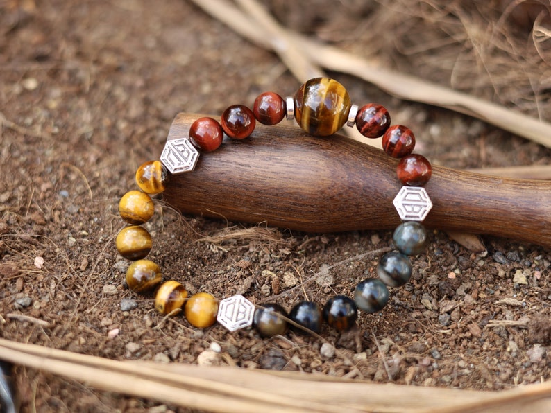 Wonderful TRI color Tiger eye bracelet with hexagon. Is found throughout nature, religions insist it is a symbol of harmony and balance
