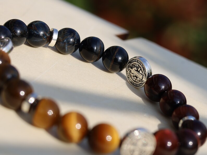 Devoted TRI color Tiger eye bracelet with Jesus and Latin Cross. Pagan symbol in Asian and African countries and a platform for crucifixion