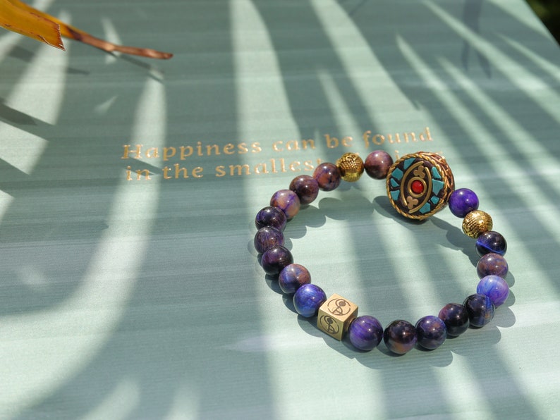 Decorative Galaxy Tiger Eye Gemstone Grd AA with Handmade Indonesia Bead combined with Wajakaa © Logo bead. powerful and pure.