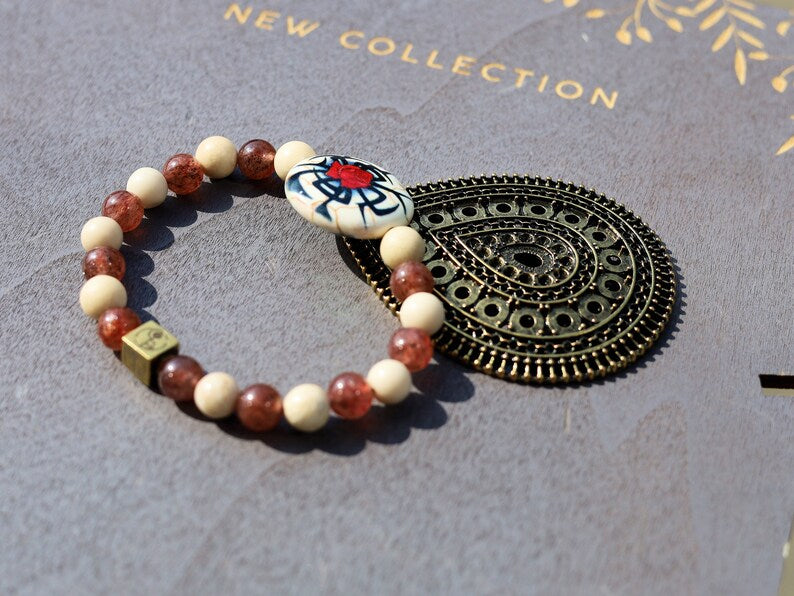 Engaging Strawberry Quartz and White Jasper with Wajakaa © Logo bead. bringing us peace in times of depression or loss